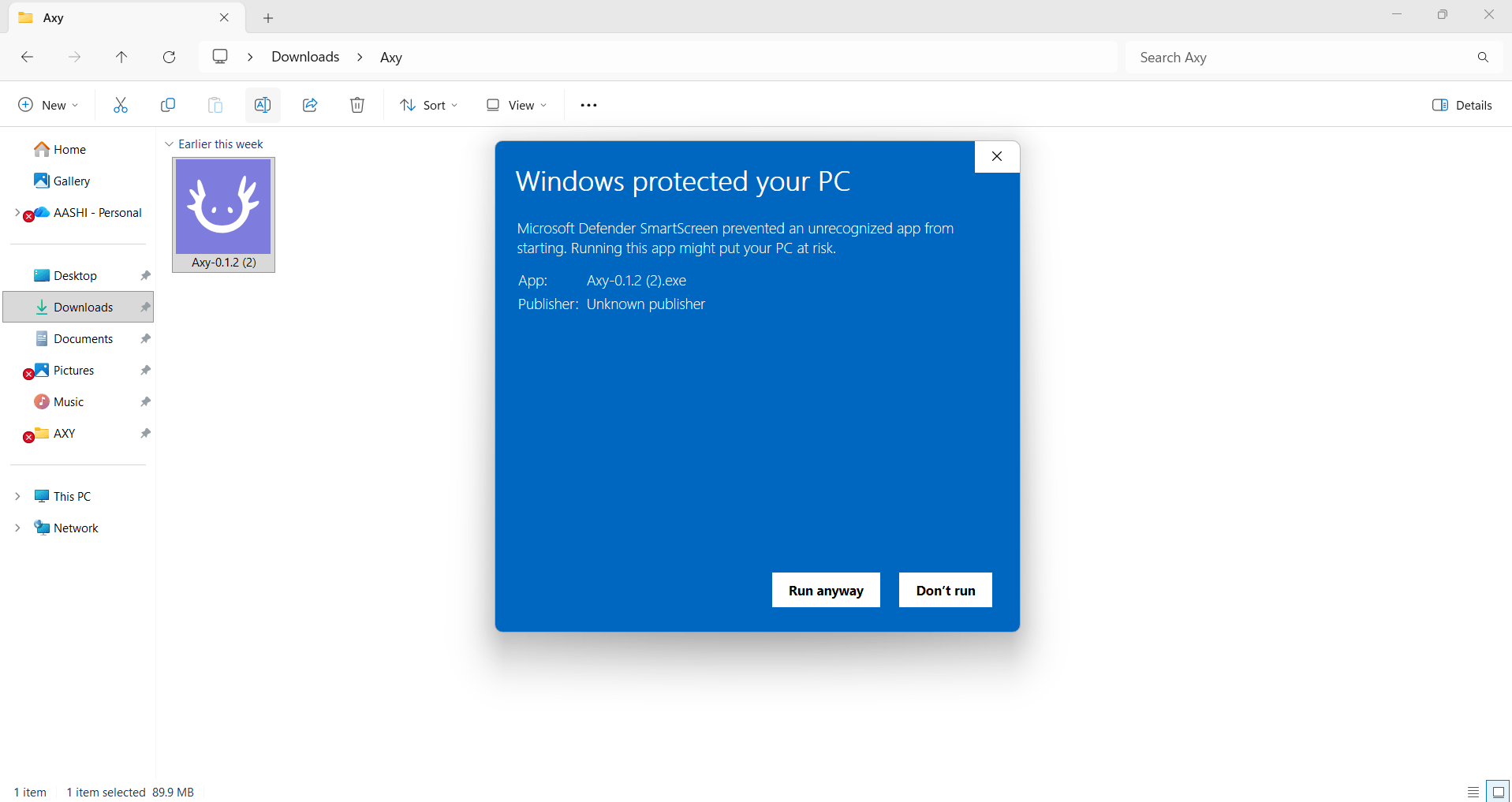 The Windows SmartScreen warning for the unsigned Axy installer, with More info and Run anyway